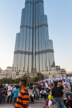 DUBAI, UAE - JANUARY 01: People crowd in front of Burj al Khalifa on January 01, 2015 in Dubai, United Arab Emirates