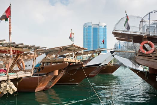 Old fishing boats in Abu Dhabi, UAE. Overcast day