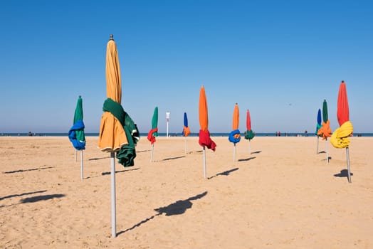 The famous colorful parasols on Deauville beach, Normandy, Northern France