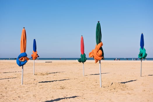 The famous colorful parasols on Deauville beach, Normandy, Northern France
