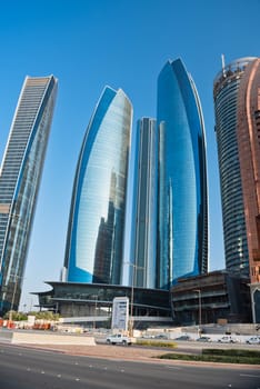 ABU DHABI, UAE - DECEMBER 22: Abu Dhabi Downtown streets with skyscrapers on December 22, 2014. United Arab Emirates