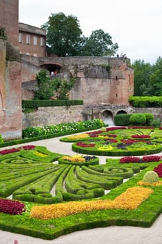 ALBI, FRANCE - AUGUST 09: Palais de la Berbie Gardens at Albi, Tarn, France on August 09, 2014. Beautiful flowerbed