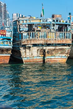 UAE, DUBAI - DECEMBER 27: traditional arabic cargo boats at Dubai creek on December 27, 2014