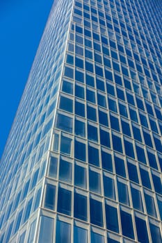 Office glass skyscraper building. Vertical filtered shot