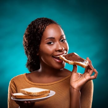 gorgeous young woman eating hazelnut cocoa spread on sliced bread, AI generated image
