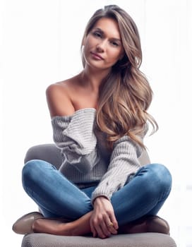gorgeous young woman seated on the floor, AI generated image