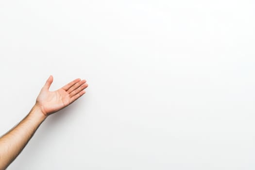 An open palm is presented in a welcoming gesture, with a focus on the hands details against a pristine white background, conveying openness and approachability.