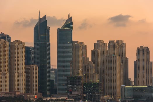 UAE, DUBAI - DECEMBER 28: Evening cityscape of Dubai city, United Arab Emirates on December 28, 2014