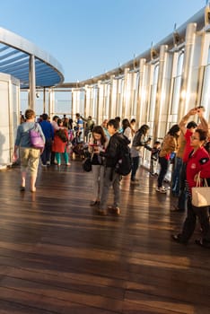 DUBAI, UAE - JANUARY 02: people at the top the observation deck of the highest building in the world Burj al Khalifa on January 02, 2015 in Dubai, United Arab Emirates