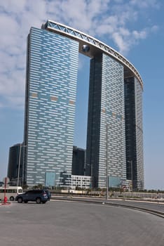 ABU DHABI, UAE - DECEMBER 24: Abu Dhabi streets with The Gate Towers skyscrapers on December 24, 2014. United Arab Emirates
