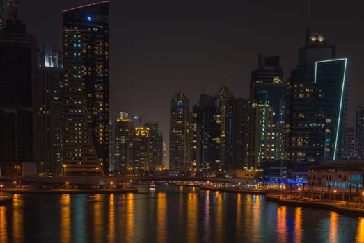 UAE, DUBAI - DECEMBER 31: night view of Dubai Marina, United Arab Emirates - the largest man-made marina in the world on December 31, 2014