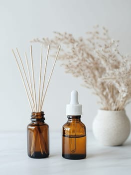 Aromatic oils and diffuser sticks in amber bottles, creating a serene and fragrant atmosphere.