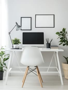 Minimalist home office interior with white desk, computer, chair and empty frames on wall, stylish workspace with plants and copy space.