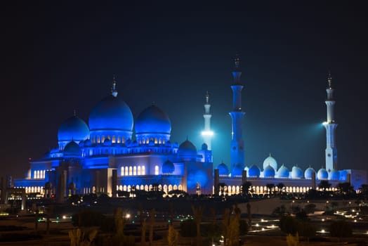 View of famous Sheikh Zayed White Mosque in Abu Dhabi, UAE at night