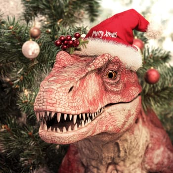 A dinosaur is dressed in a festive Christmas hat with decorations surrounding it adding a playful touch to the holiday atmosphere.