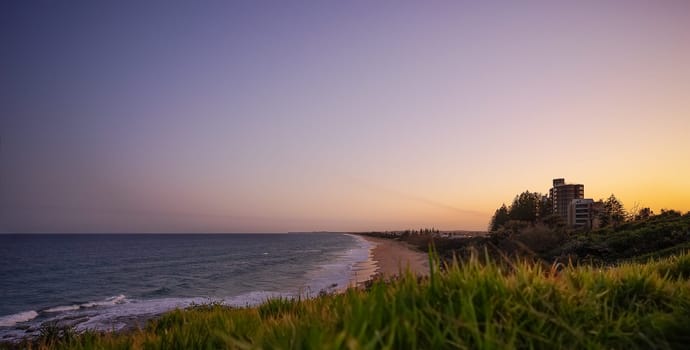 A panoramic view of the Sunshine Coast beachfront from Point Cartwright Buddina south to Caloundra at sunset