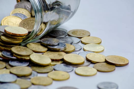 Golden coins representing business, investment or any monetary concept. Customizable space for text.