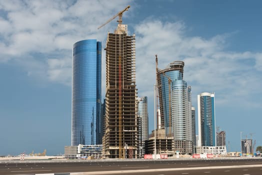 Abu Dhabi new district with skyscrapers construction. United Arab Emirates