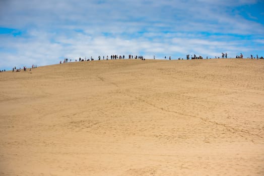 People visiting the famous highest sand dune in Europe Dune of Pyla