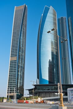 ABU DHABI, UAE - DECEMBER 22: Abu Dhabi Downtown streets with skyscrapers on December 22, 2014. United Arab Emirates