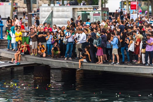 SPAIN, BARCELONA - SEPTEMBER 12: crowd of people on the pier on September 12, 2015