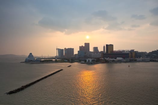 MACAO, MACAO - SEPTEMBER 28: Skyline of Macao cityscape at outer harbour before sunset on September 28, 2012