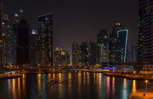 UAE, DUBAI - DECEMBER 31: night view of Dubai Marina, United Arab Emirates - the largest man-made marina in the world on December 31, 2014