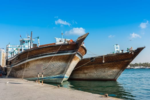 UAE, DUBAI - DECEMBER 27: traditional arabic cargo boats at Dubai creek on December 27, 2014