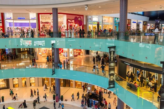 UAE, DUBAI - DECEMBER 25: people do shopping in Dubai Mall store center on December 25, 2014