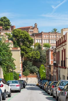 SPAIN, BARCELONA - SEPTEMBER 13: Cars parking on Barcelona street on September 13, 2015