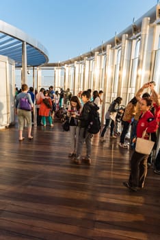 DUBAI, UAE - JANUARY 02: people at the top the observation deck of the highest building in the world Burj al Khalifa on January 02, 2015 in Dubai, United Arab Emirates