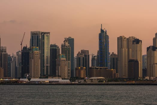 UAE, DUBAI - DECEMBER 28: Evening cityscape of Dubai city, United Arab Emirates on December 28, 2014