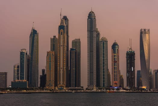 UAE, DUBAI - DECEMBER 28: Evening cityscape of Dubai city, United Arab Emirates on December 28, 2014