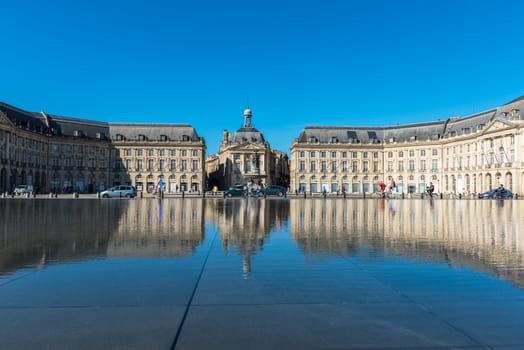 FRANCE, BORDEAUX - SEPTEMBER 20: Famous mirror fountain in front of Place de la Bourse in Bordeaux, France on September 20, 2015