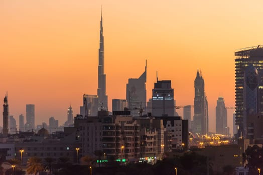 UAE, DUBAI - DECEMBER 27: view of Dubai cityscape from Dubai creek bank at night on December 27, 2014