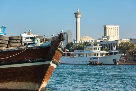 UAE, DUBAI - DECEMBER 27: traditional arabic cargo boats at Dubai creek on December 27, 2014