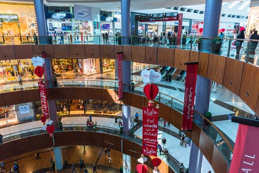 UAE, DUBAI - DECEMBER 25: people do shopping in Dubai Mall store center on December 25, 2014
