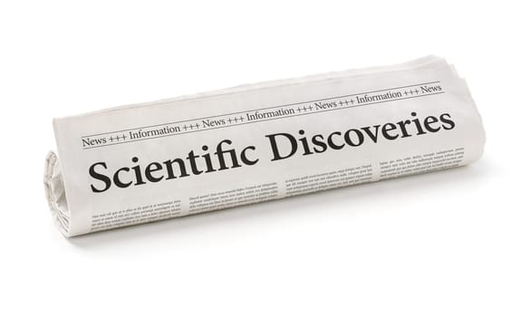 Rolled newspaper with the headline Scientific Discoveries