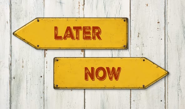 Direction signs on a wooden wall - Later or Now