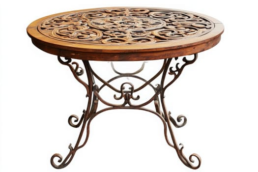 A decorative wrought iron patio table stands isolated, showcasing intricate designs in its tabletop. Ideal for outdoor gatherings, it exudes charm and functionality in serene surroundings.