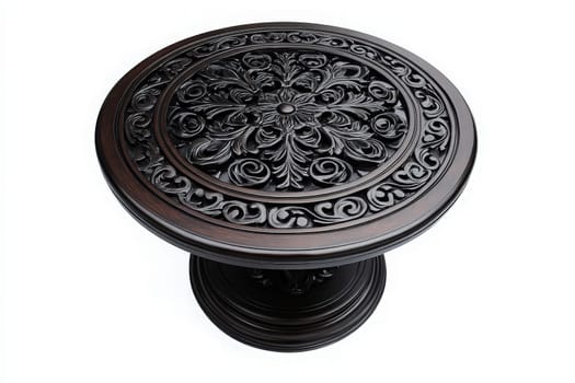 This isolated round patio table features a beautifully carved floral pattern, showcasing craftsmanship and style. Perfect for outdoor settings, it invites dining and relaxation.