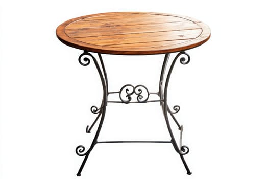 A rustic wooden patio table stands alone, showcasing its circular top and ornate iron legs. Ideal for outdoor use, it awaits gatherings and shared meals in warm weather.