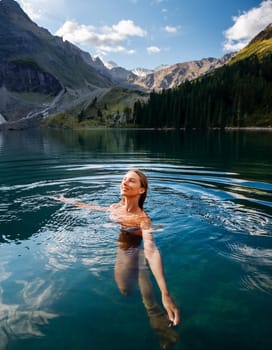 pretty young swimming woman in mountain lake, AI generated image
