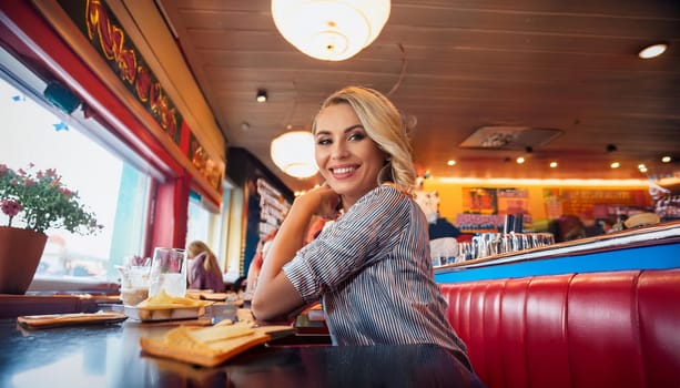 gorgeous young woman in american diner restaurant, AI generated image