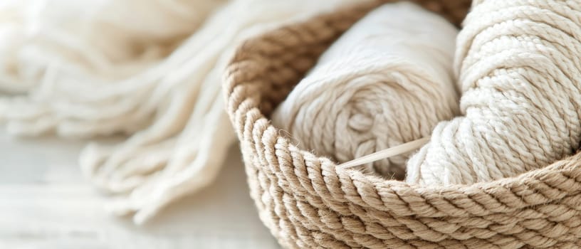 A cozy basket filled with soft knitting yarns, perfect for crafting and knitting enthusiasts.