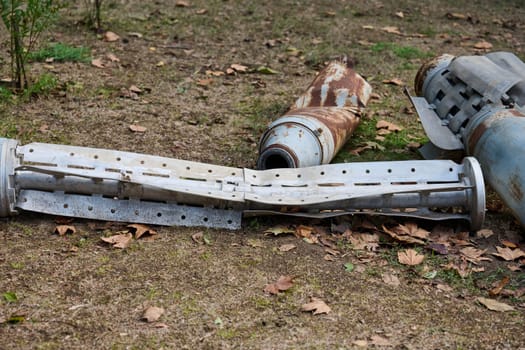 The tail section of a 220 mm rocket for the Uragan rocket fire system on a city flowerbed in Mykolaiv