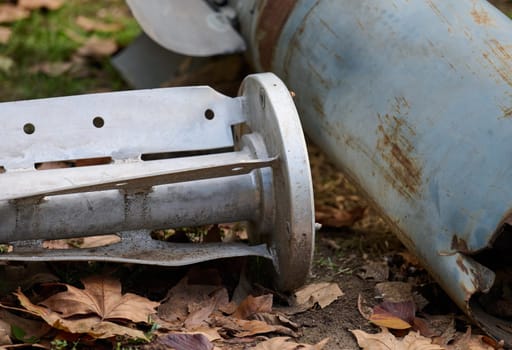 The tail section of a 220 mm rocket for the Uragan rocket fire system on a city flowerbed in Mykolaiv