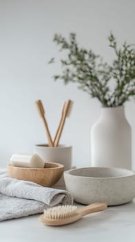 Eco friendly bathroom essentials including bamboo brushes, ceramic bowls, and fresh greenery creating a sustainable spa atmosphere.