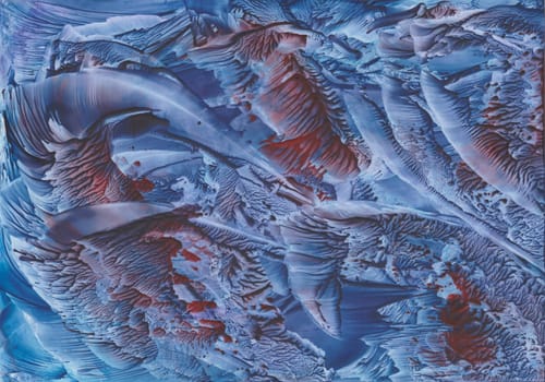 Abstract encaustic painting with textures in blue and red - painted with a painting iron