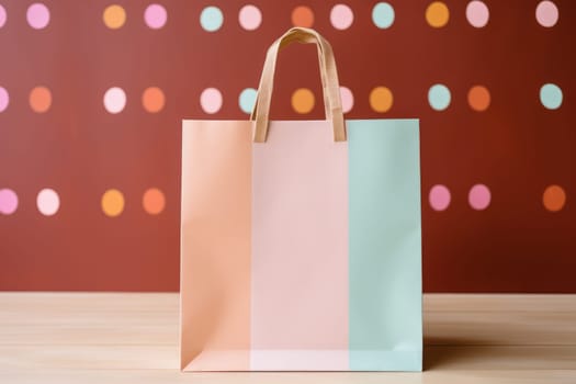 pale pink paper bag for shopping on a colored background